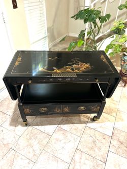 Japanese wings table  with drawer  39” long without wings (12”long each wing) 19” deep 30” height excellent condition