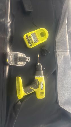 Ryobi drill with 18v lithium battery and charger