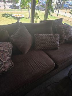 Couch lots of pillows  recently had it steam cleaned