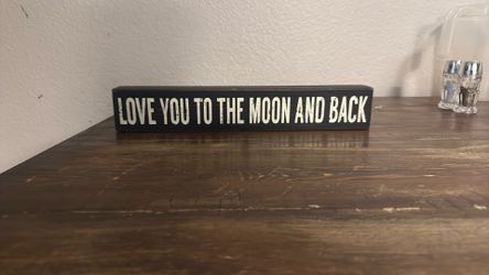 Love you to the moon and back sign