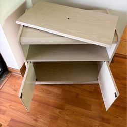 Tv Stand  swivel top on wheels / storage