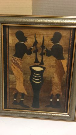 Two African themed frame pictures eight by tens