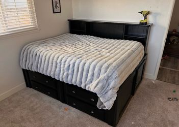 Free full size bed frame (mattress not included)