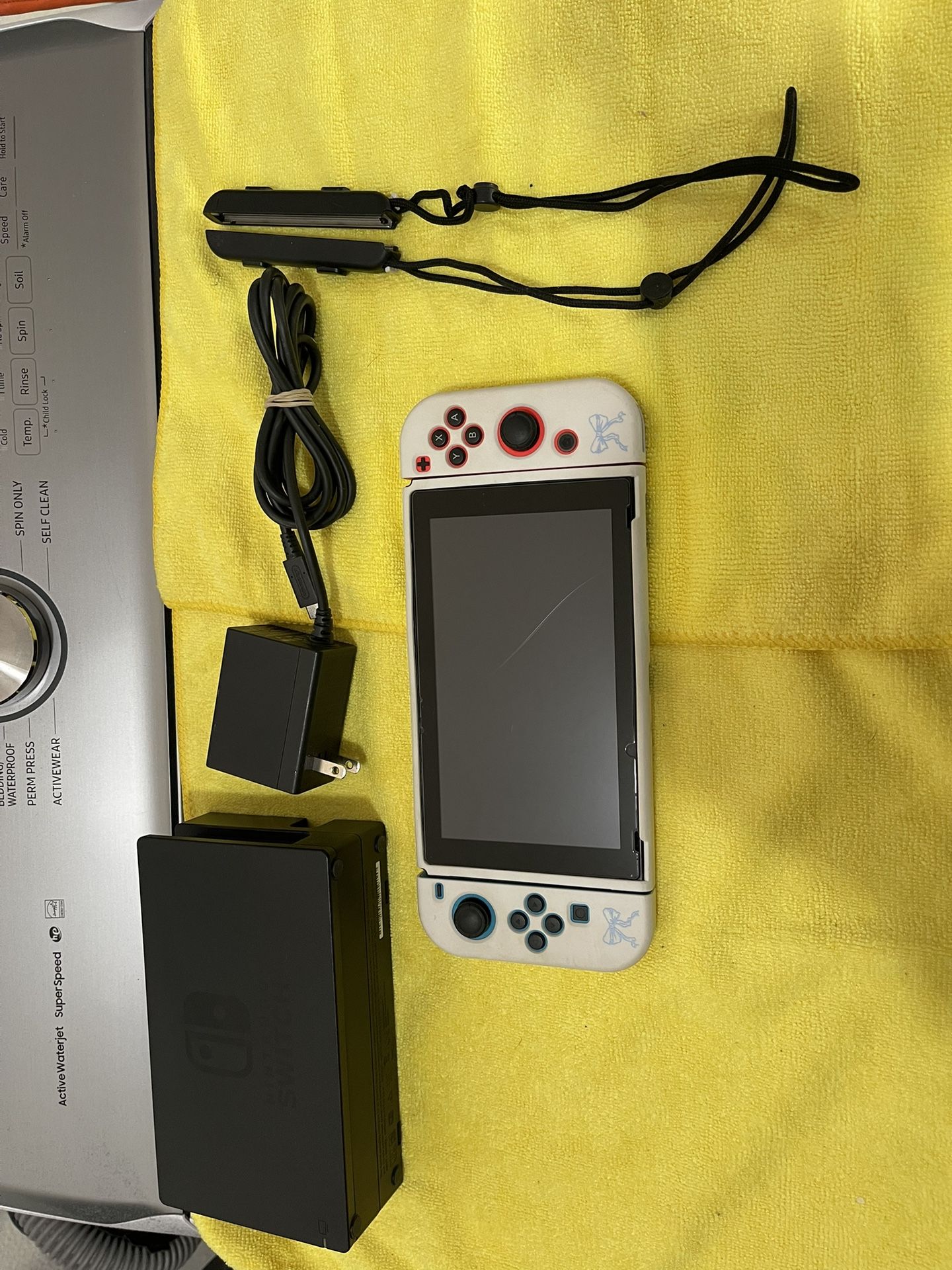 Nintendo Switch With Red And Blue Joycons