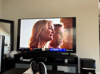 82” LG 4K Smart TV + LG 3.1.2ch Dolby Atmos Soundbar Subwoofer, & Stand