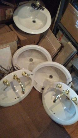 Drop in porcelain sinks ,,,5,,used,,,some with faucet