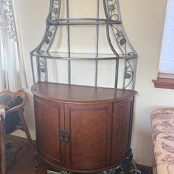 Bowfront Bakers Rack – Ornate Ironwork & Faux Leather Accents