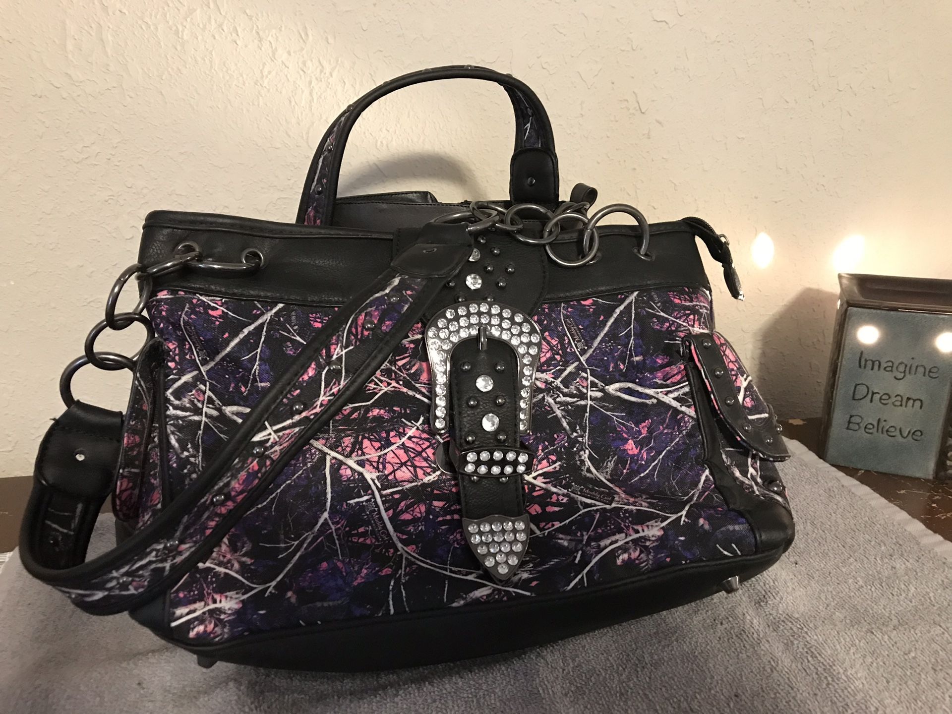 Pink camo conceal carry purse