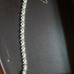 pearl with cirzona styones