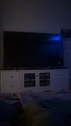 75 inch TV with a TV stand