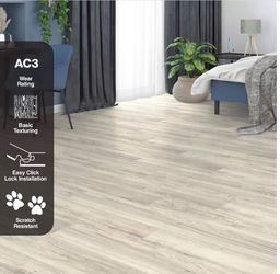 TrafficMaster Laminate Pecan Stone 7 mm T x 7.6 in. W x 50.6 in. L Click Lock Laminate Wood Flooring (24.2 sq. ft./Case)