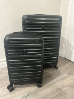 Delsey Paris 2 piece hard case luggage