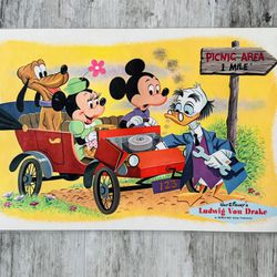 Vintage 1961 Minnie Mouse Mickey Mouse Pluto Ludwig von Drake Walt Disney reversible laminated placemat. Would also make a great wall art hanging.  