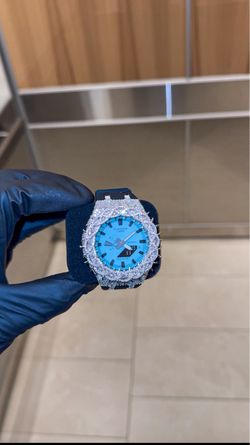 Fully customized G Shock blue and black strap with mossiante bezel