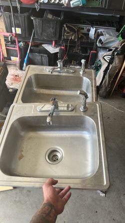 Sinks with faucet and sprayer