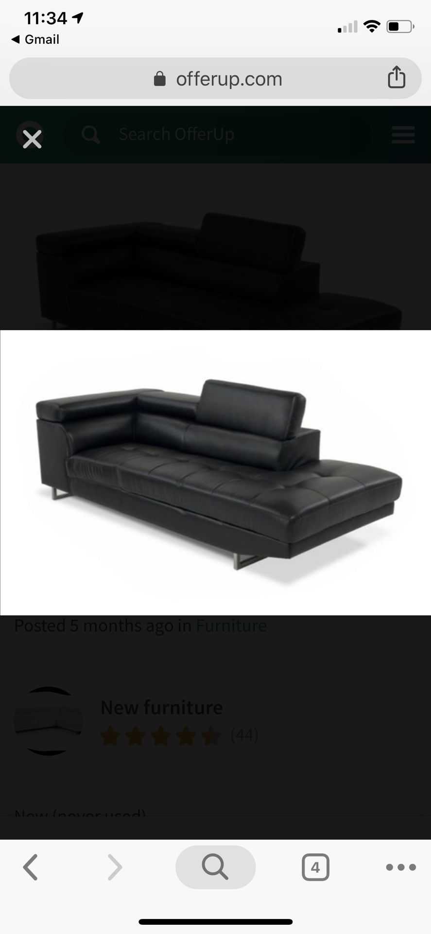 Brand new black contemporary sofa with storage space and head rest inclines