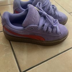 Purple Fenty Pumas
