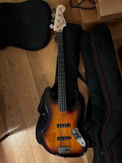Bass guitars and harmony strat