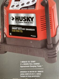 ESTATE SALE-  Battery Charger Husky Never Used In Original Box