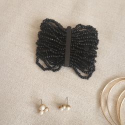 Necklaces, Earrings And A Bracelet 