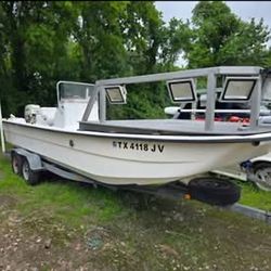 Carolina Skiff 24DLX W/ 130hp Evinrude E-TEC, Minn Kota Riptide GPS, Bowfishing Rig