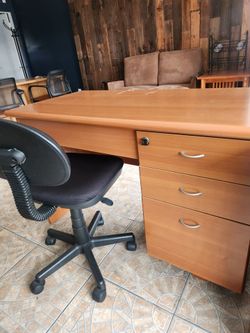 Desk with keys and chair