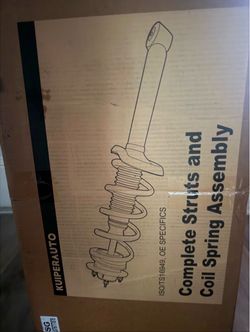 Complete Strut & Coil Spring Assembly – New”
