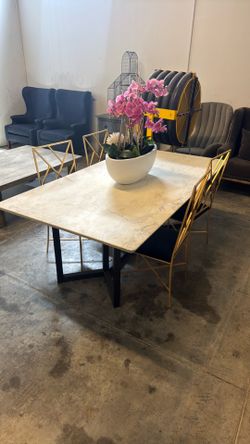 Marble Table with Steel Frame. Gold and Blue Chairs