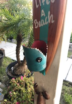 Surf board bottle opener! Different colors to choose from