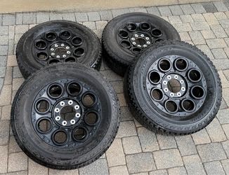 Set of 4 F250 Lariat wheels and tires