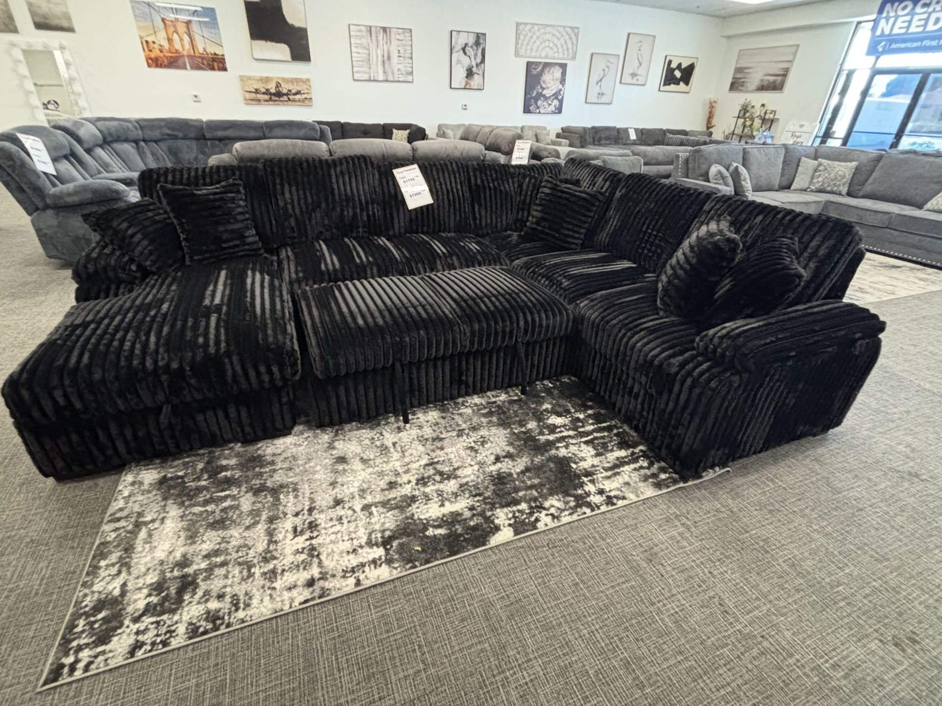 Sleep & Store! Black Corduroy Sectional – $1,799 🖤🛋️🛏️