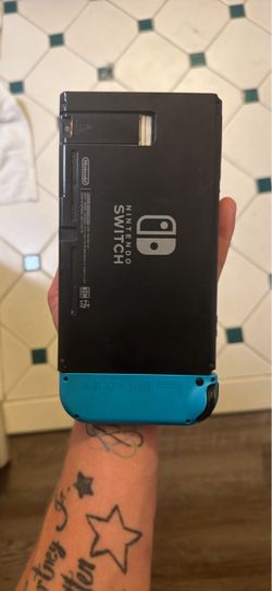Nintendo Switch Console with Neon Blue Joy-Con