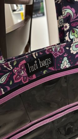Luci bags shoulder lots of pockets clear zipper pockets