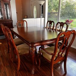 Dining Room Table, Chairs And Matching Hutch 