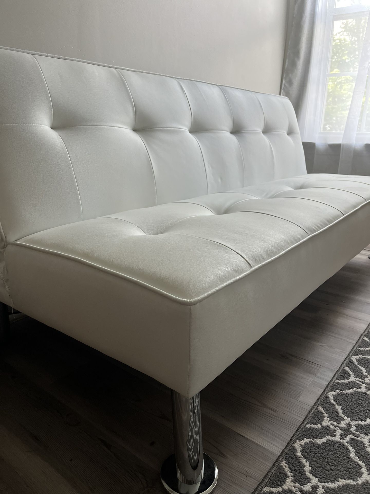 Futon - White faux leather Sofa Bed