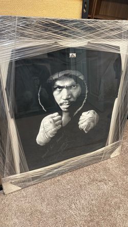 Signed framed Manny Pacquiao t shirt.