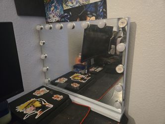 lighted Hollywood-style tabletop vanity mirror