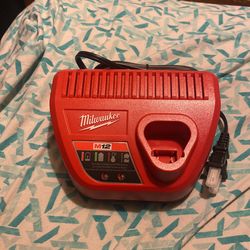 Milwaukee M12 Battery And Charger ( New )
