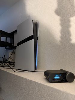 Ps5 pro with steel series arctis nova pro headset
