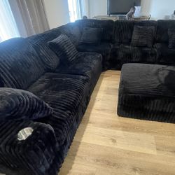 Large Black Corduroy Sectional With Ottoman
