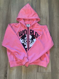 A World’s View pink zip up hoodie