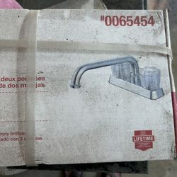 Laundry faucet new in the box