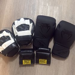 Venum boxing gloves coms with training pads, and weights