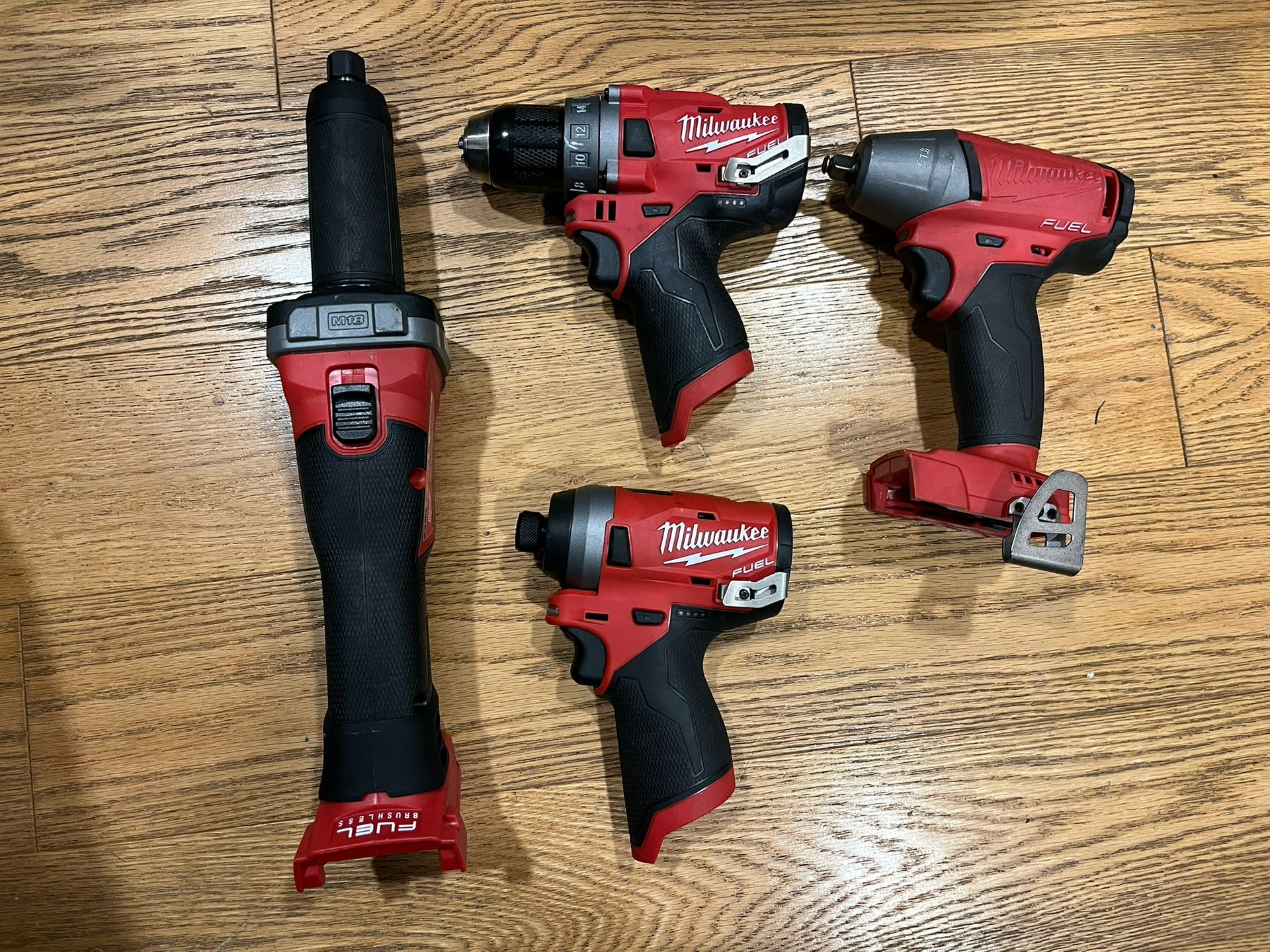 4 Set of Milwaukee power drills including; 3 brushless motor power drills and 1 M18 FUEL 18V Lithium-Ion