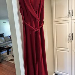 Red Sleeveless Jumpsuit with Tie Waist.