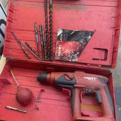 HILTI drill with drill bits has battery and charger, but I’m sure if they operate