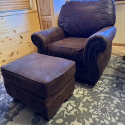 Brown leather recliner and footrest
