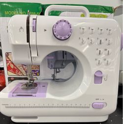 Mini multifunctional sewing machine. Retail: $109