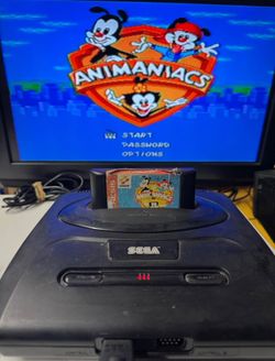 Sega Genesis with Animaniacs game and controller