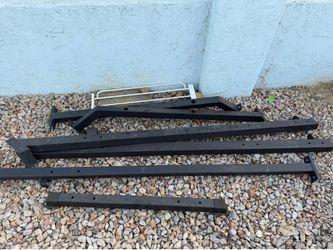 FREE METAL BARS - from a hack squat machine. CURBSIDE PICKUP